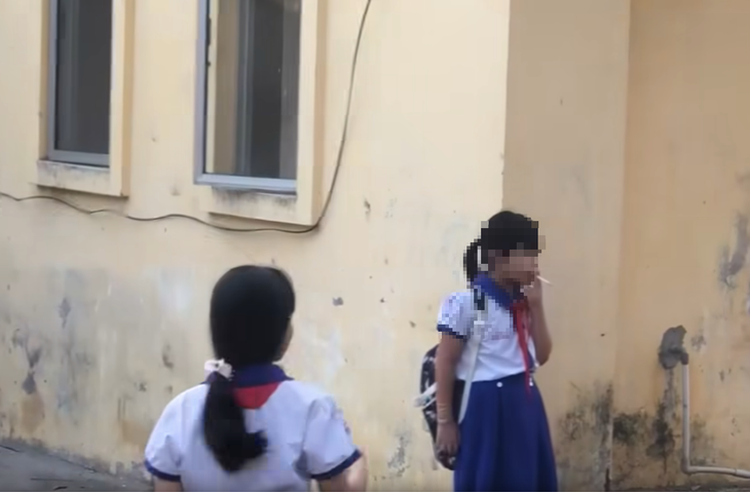 Authorities verifying video of 5 elementary school girls smoking in southern Vietnam