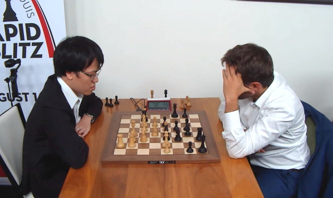 Le Quang Liem (L) and Aronian Levon