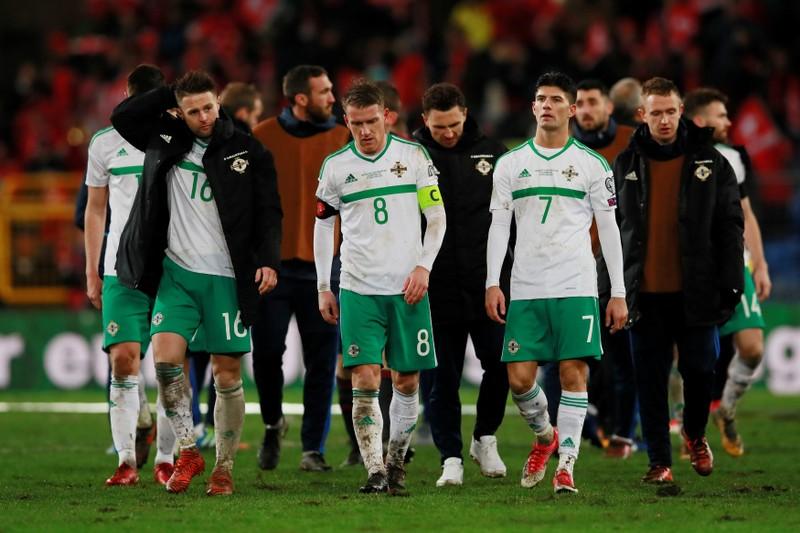 Soccer Football - 2018 World Cup Qualifications - Europe - Switzerland vs Northern Ireland - St. Jakob-Park, Basel, Switzerland - November 12, 2017 Northern Ireland’s Steven Davis and Jordan Jones look dejected after the match Action Images via Reuters/Jason Cairnduff