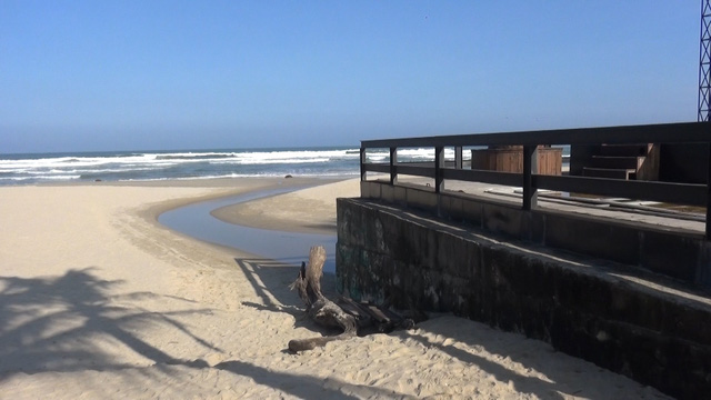 A stream of wastewater is seen at a discharge point along the My Khe Beach in Da Nang. Photo: Tuoi Tre