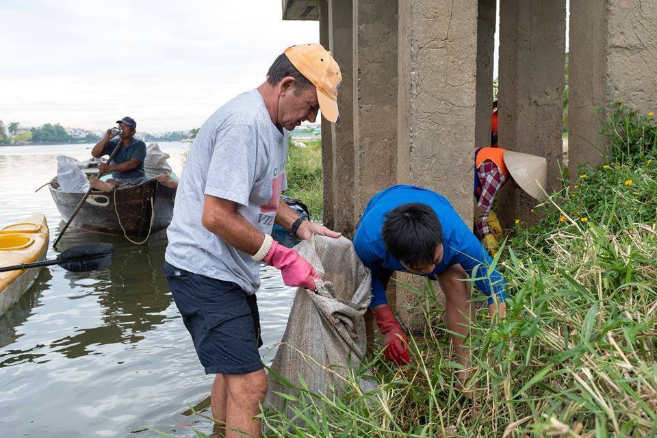 The team cleans along the riverbank in Hoi An in this supplied photo.