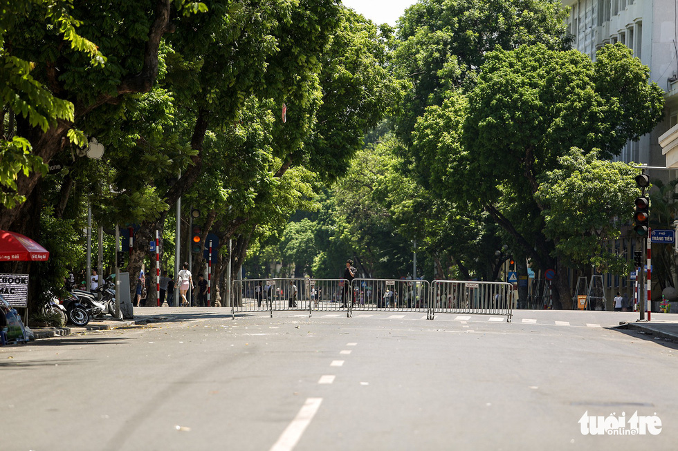 The walking street near Ho Guom (Sword Lake) is quite empty on a Sunday morning.
