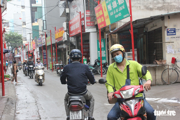 Motorbikes run on Dinh Thon Street in Hanoi, Vietnam. Photo: Tuoi Tre