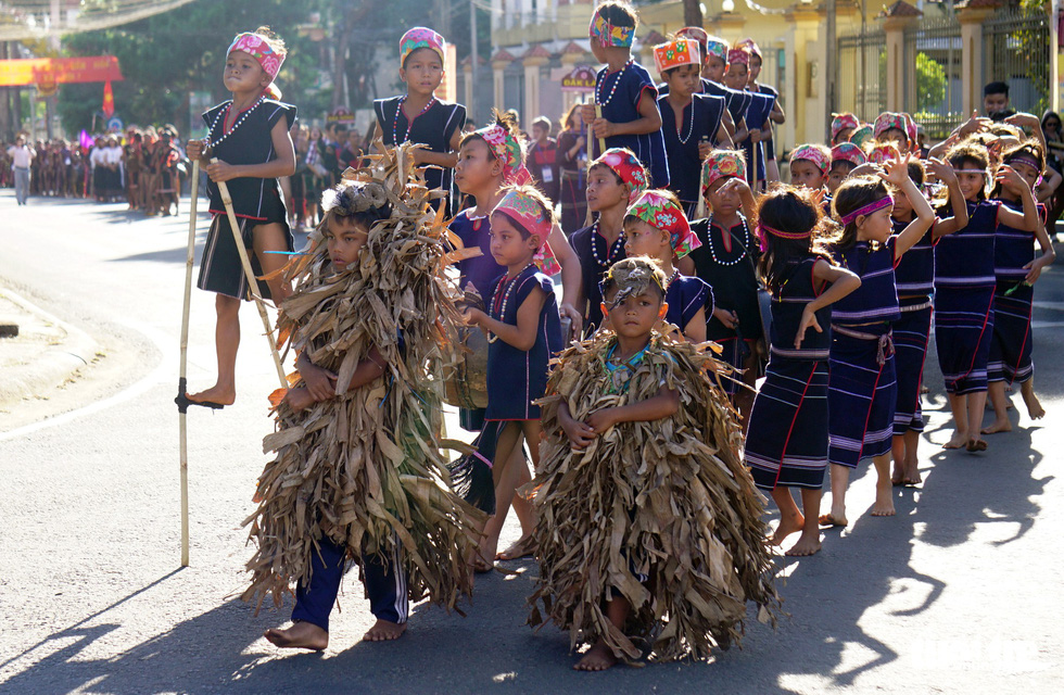Children dress up as beasts in a street parade - one of the activities at the Gong Festival in the Central Highlands province of Gia Lai. Photo: Tuoi Tre