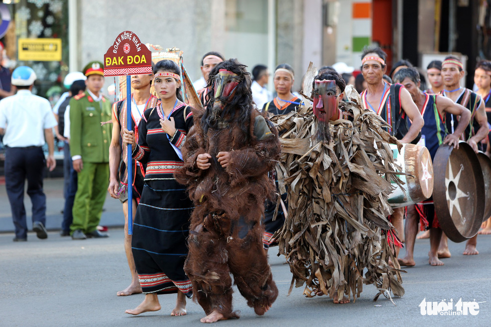 Artists dress up as beasts in a street parade - one of the activities at the Gong Festival in the Central Highlands province of Gia Lai. Photo: Tuoi Tre