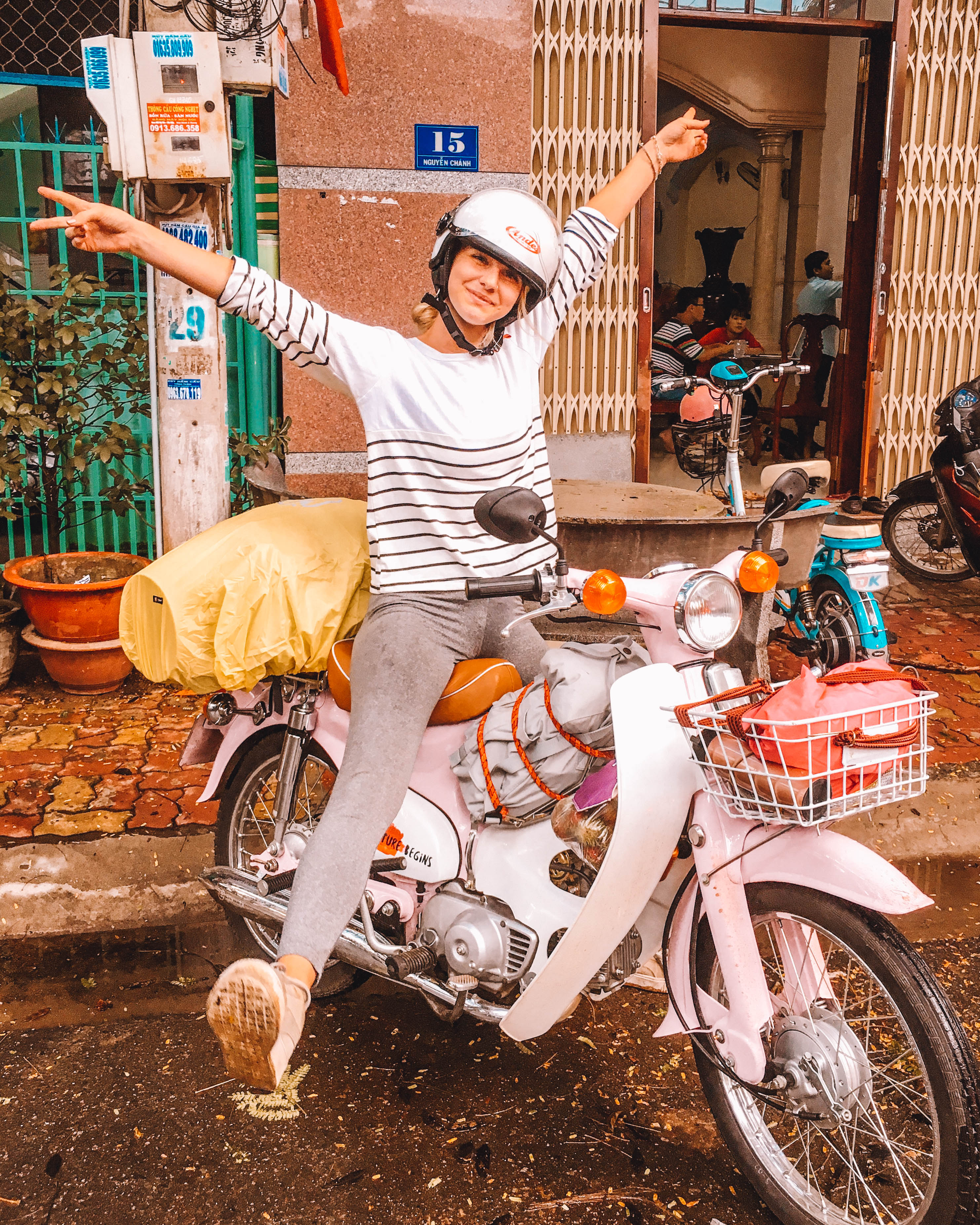 Frances is seen with her pink Honda Cub in a photo she provided Tuoi Tre News.