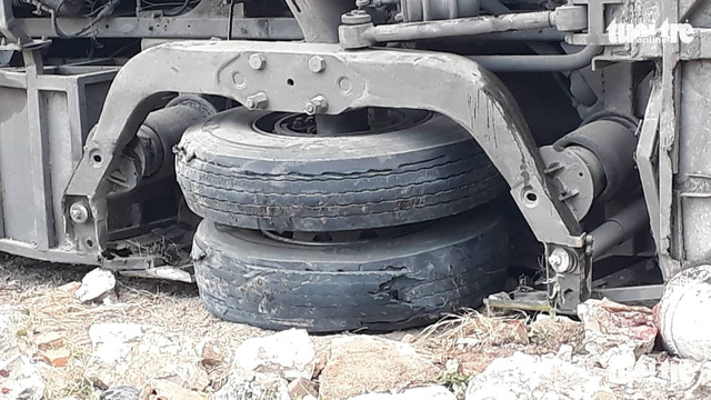 Two of the bus’s wheels are seen after it slams into a house in Nha Trang City, south-central Vietnam, February 14, 2019. Photo: Thai Thinh / Tuoi Tre