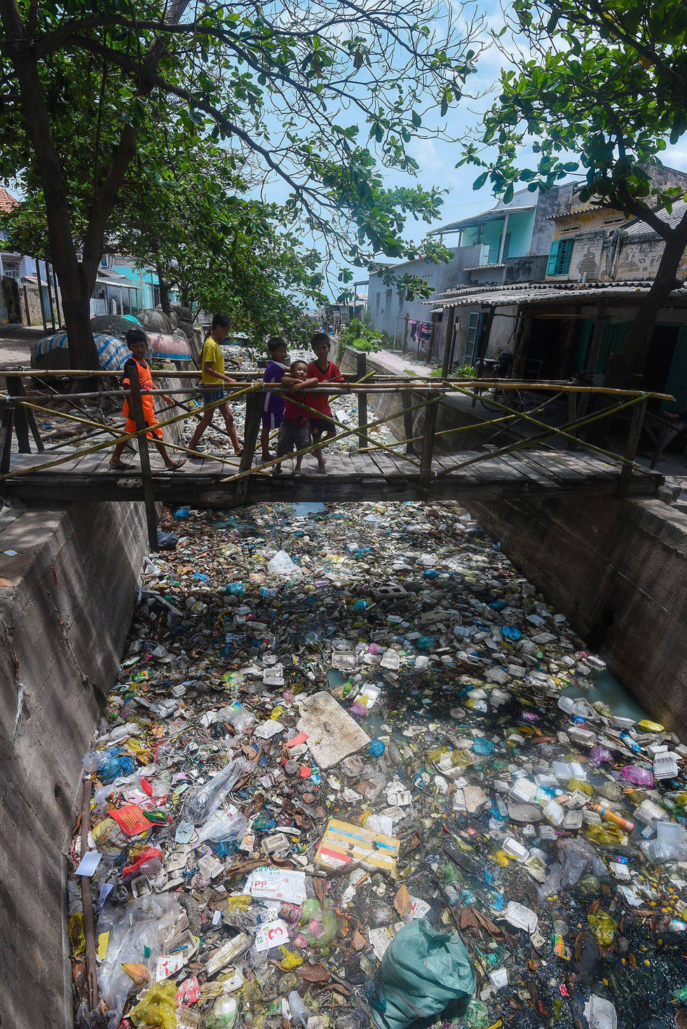 A canal is full of garbage