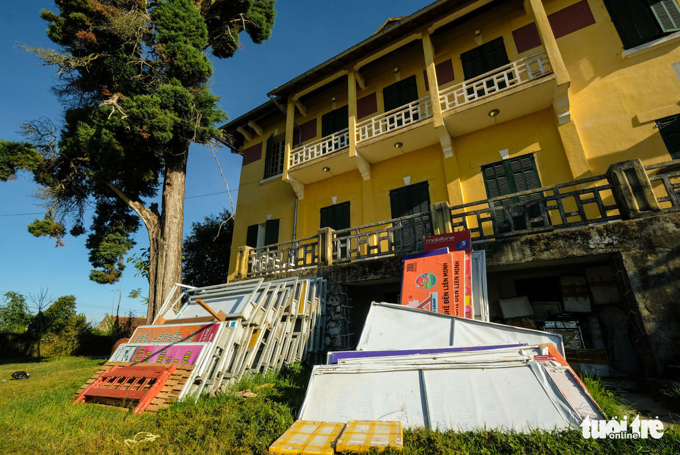 Advertisement billboards are stacked outside the ‘Dinh Tinh Truong’ provincial governor’s palace in Da Lat, Vietnam. Photo: Mai Vinh / Tuoi Tre