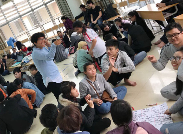 Thuy Tien (standing) among the participants at a training on sign language in Hanoi. Photo: Supplied