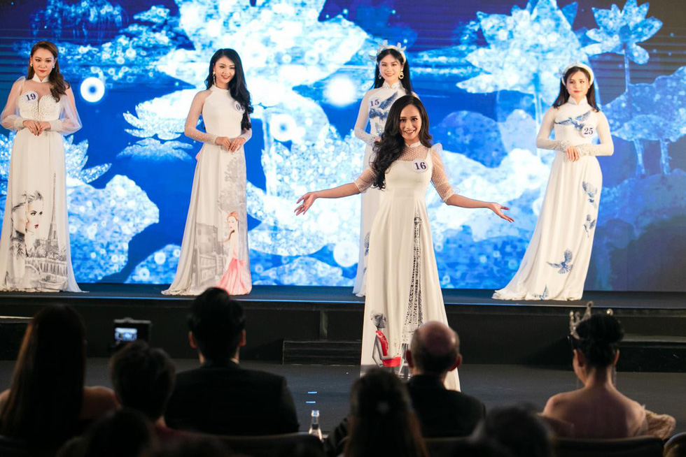 Tran Vu Huong Tra stops on stage to showcase her ao dai at the finale night of Miss Vietnam World France 2019 in Paris on April 20, 2019. Photo: Supplied