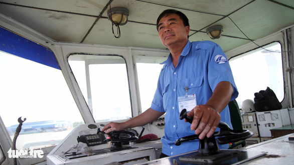 Nguyen Van Dong, a ferry captain for the Vam Cong Group. Photo: Mau Truong / Tuoi Tre