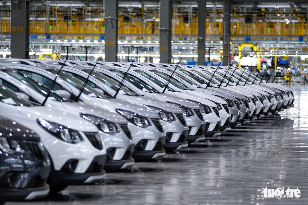 Complete cars are seen at the plant. Photo: Nam Tran / Tuoi Tre