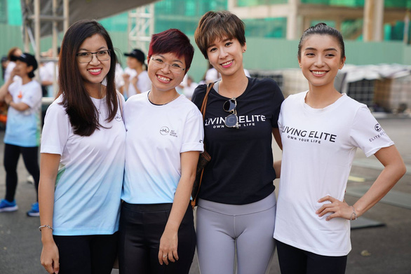Thuy Muoi (second from left) poses for a photo with her volunteers at the Salt Cancer Initiative. Photo: SCI