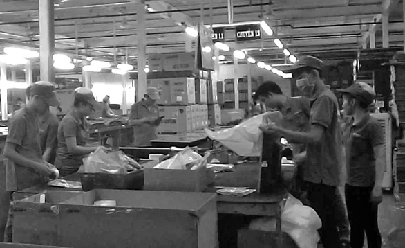 Employees are seen inside an Asanzo factory in Ho Chi Minh City. Photo: Tuoi Tre