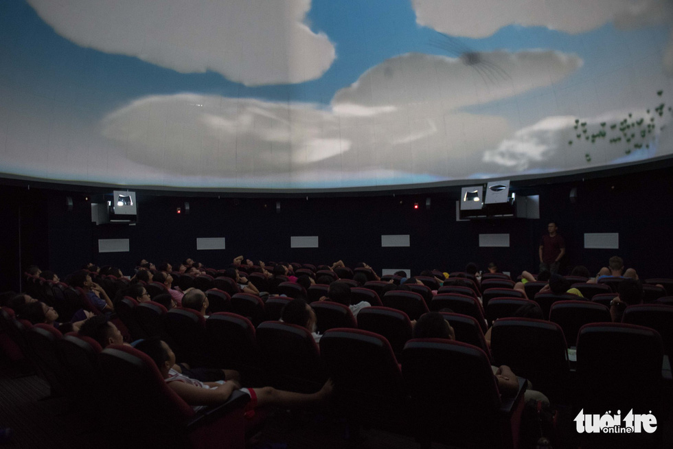 Audience watch a science documentary in an auditorium at the Hoa Lac Astronomical Station. Photo: Hoang Thanh Tung / Tuoi Tre