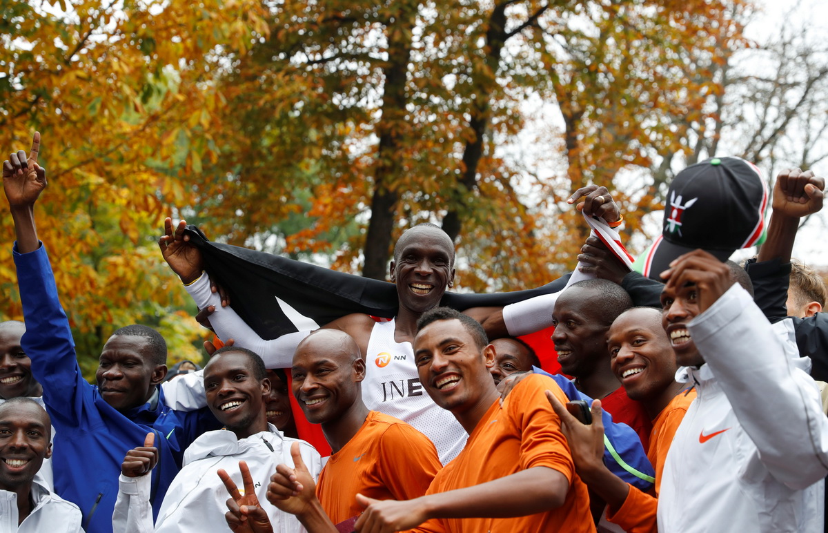 Kenya's Eliud Kipchoge, the marathon world record holder, celebrates after a successful attempt to run a marathon in under two hours in Vienna, Austria, October 12, 2019. Photo: Reuters