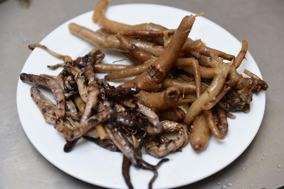 Peanut worms and poor man’s ginseng are added to the broth at Pho Ngoc Linh. Photo: Quang Dinh / Tuoi Tr