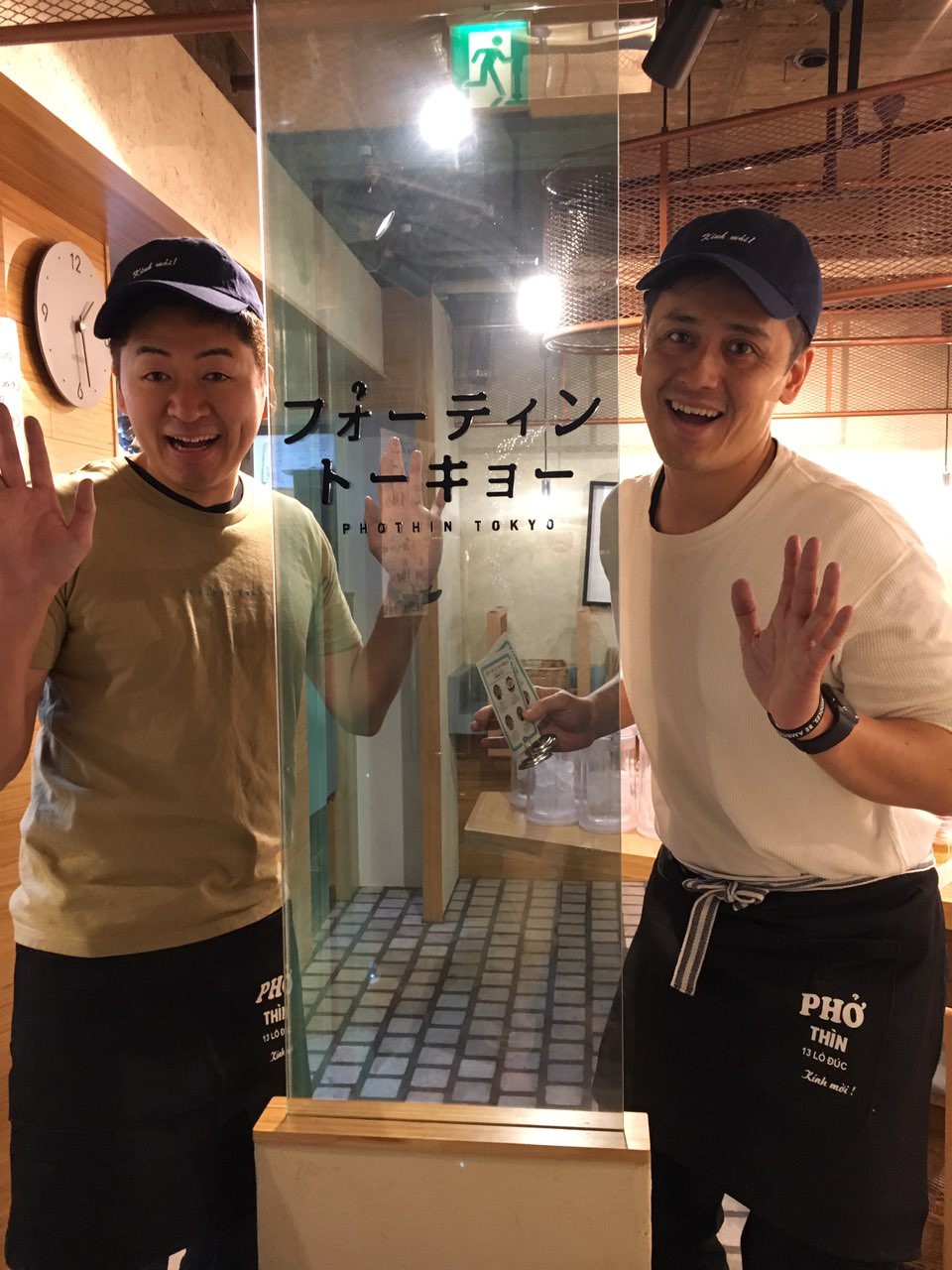 Kenji Sumi (left) smiles with his staff at Pho Thin Tokyo in Tokyo, Japan. Photo: Ngoc Anh / Tuoi Tre