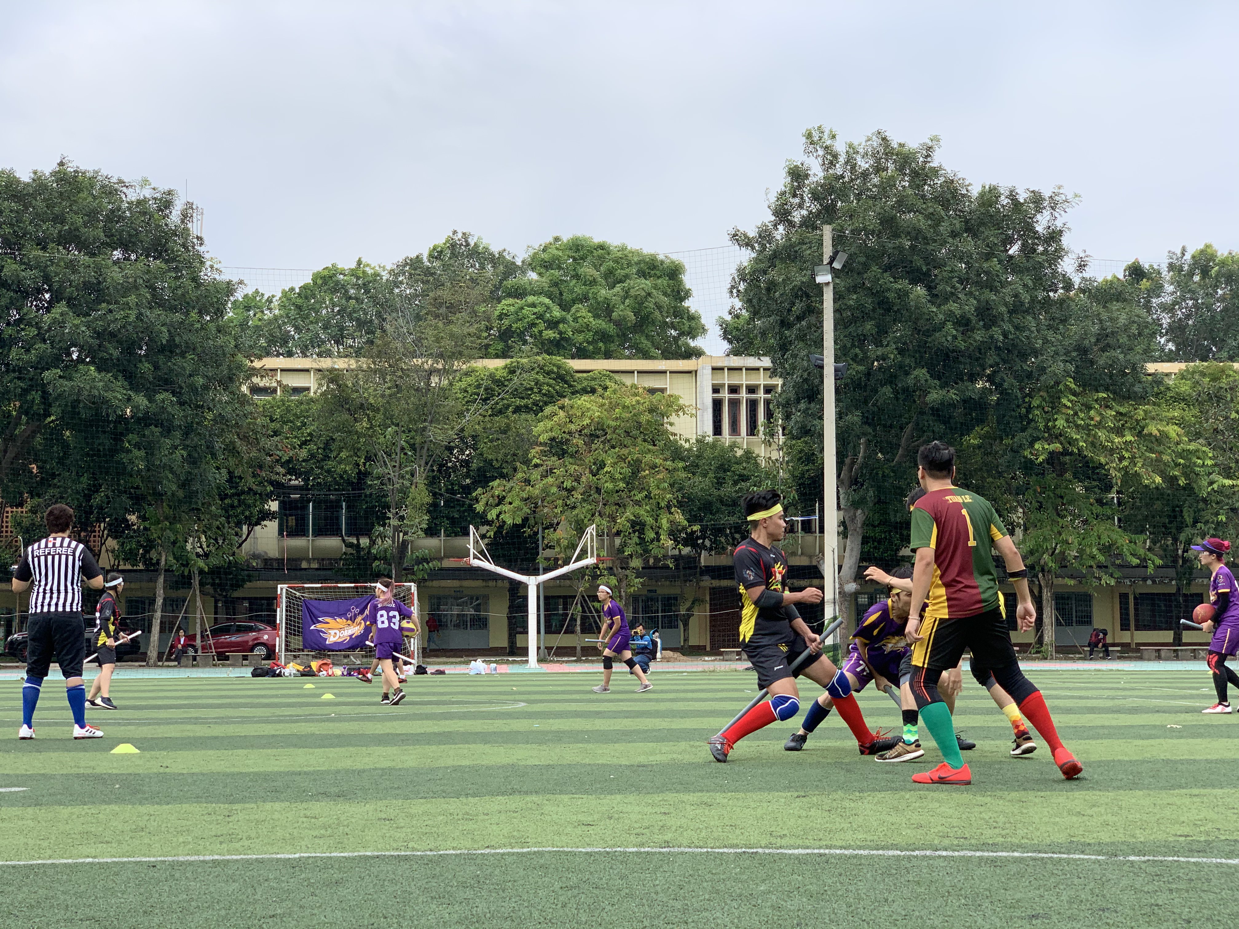 Players fight for a 'snitch' during a match in the maiden Vietnam Quidditch Cup organized by the Vietnam Quidditch Association  in Tan Binh District, Ho Chi Minh City, November 10, 2019. Photo: Bao Anh / Tuoi Tre News
