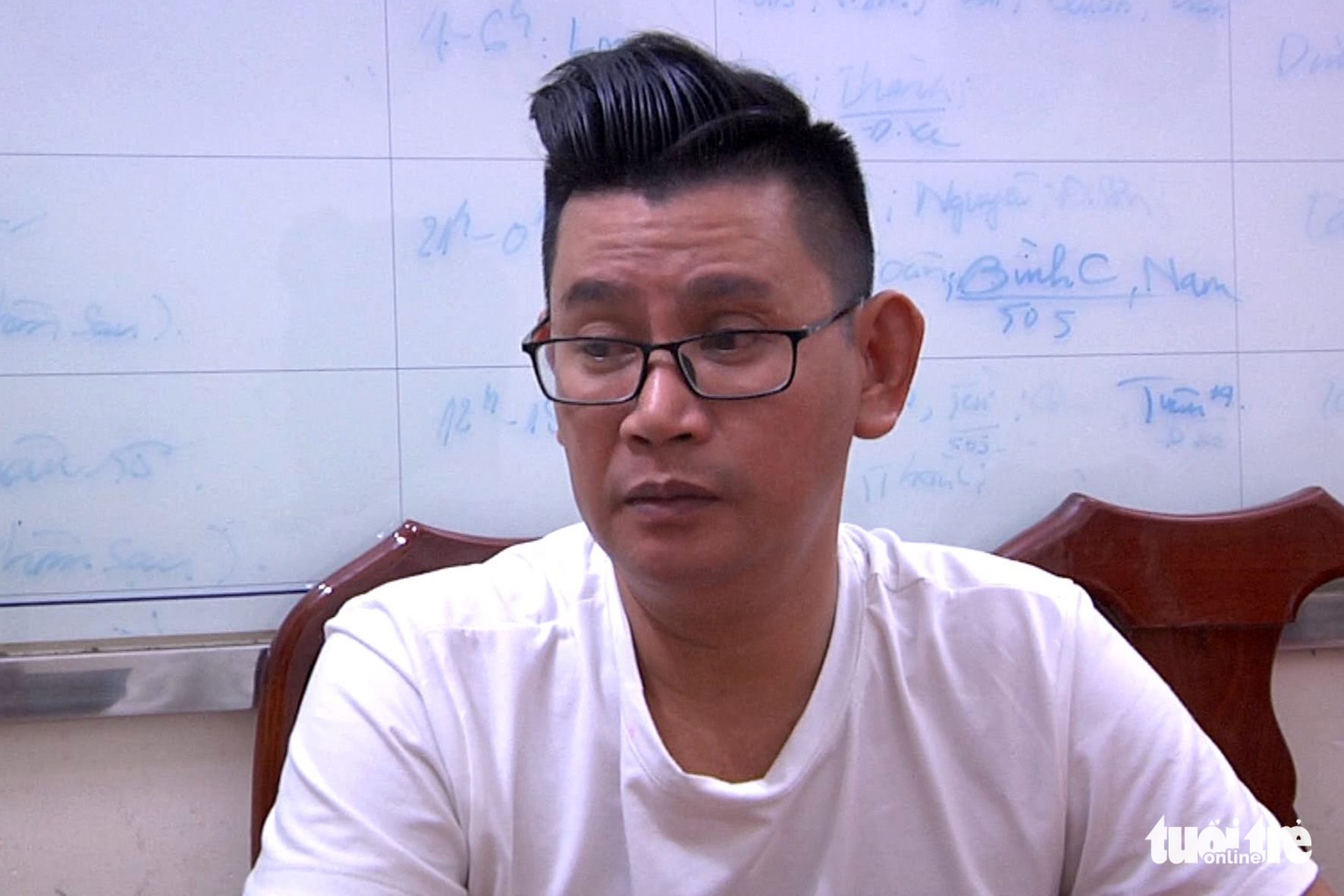 Nguyen Hong An, manager of Vic Beer Club, is held at the police station on December 8, 2019. Photo: B.A / Tuoi Tre
