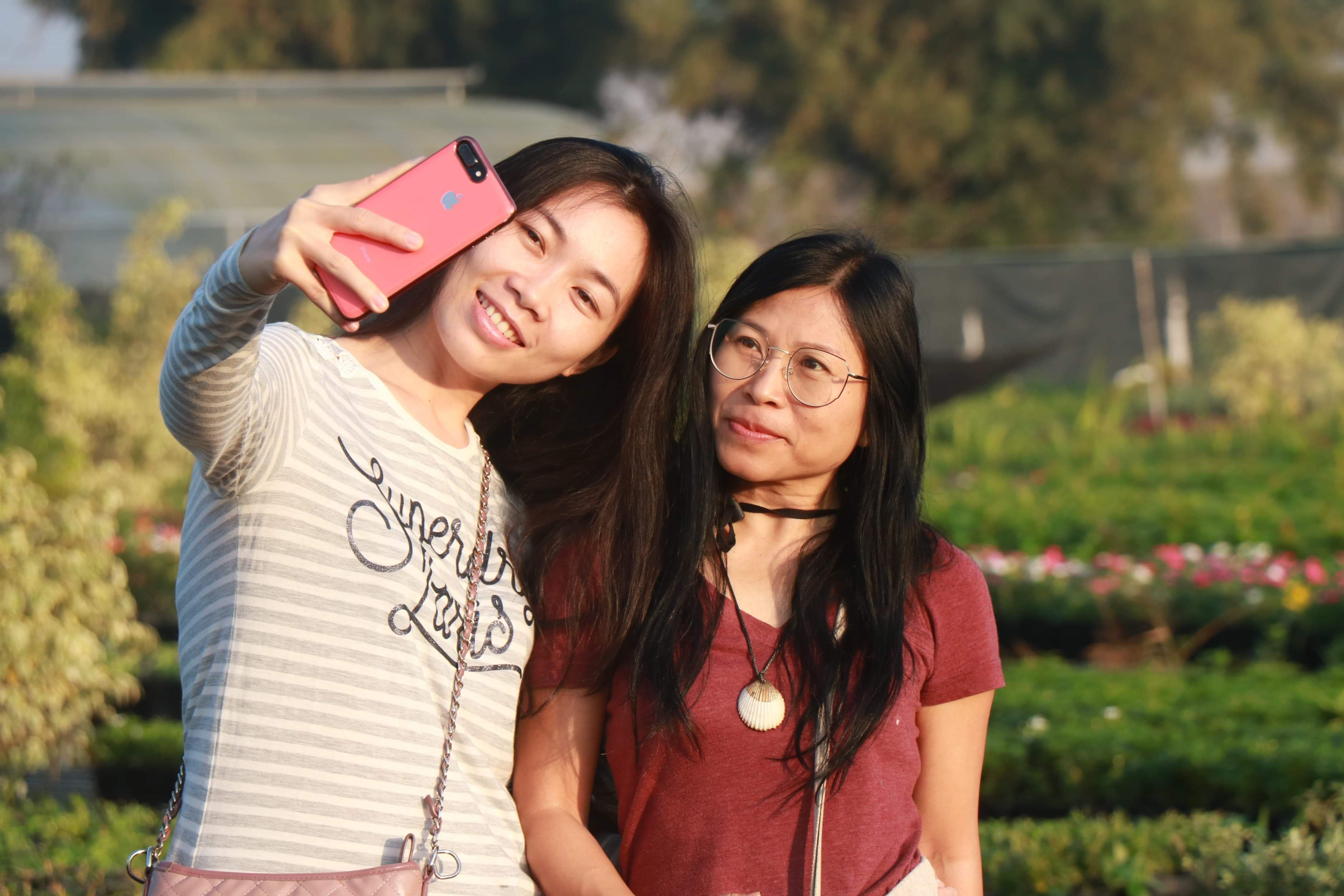 Women take a selfie at the Tan Quy Dong flower neighborhood in Sa Dec City, Dong Thap Province, southern Vietnam. Photo: Hong Van