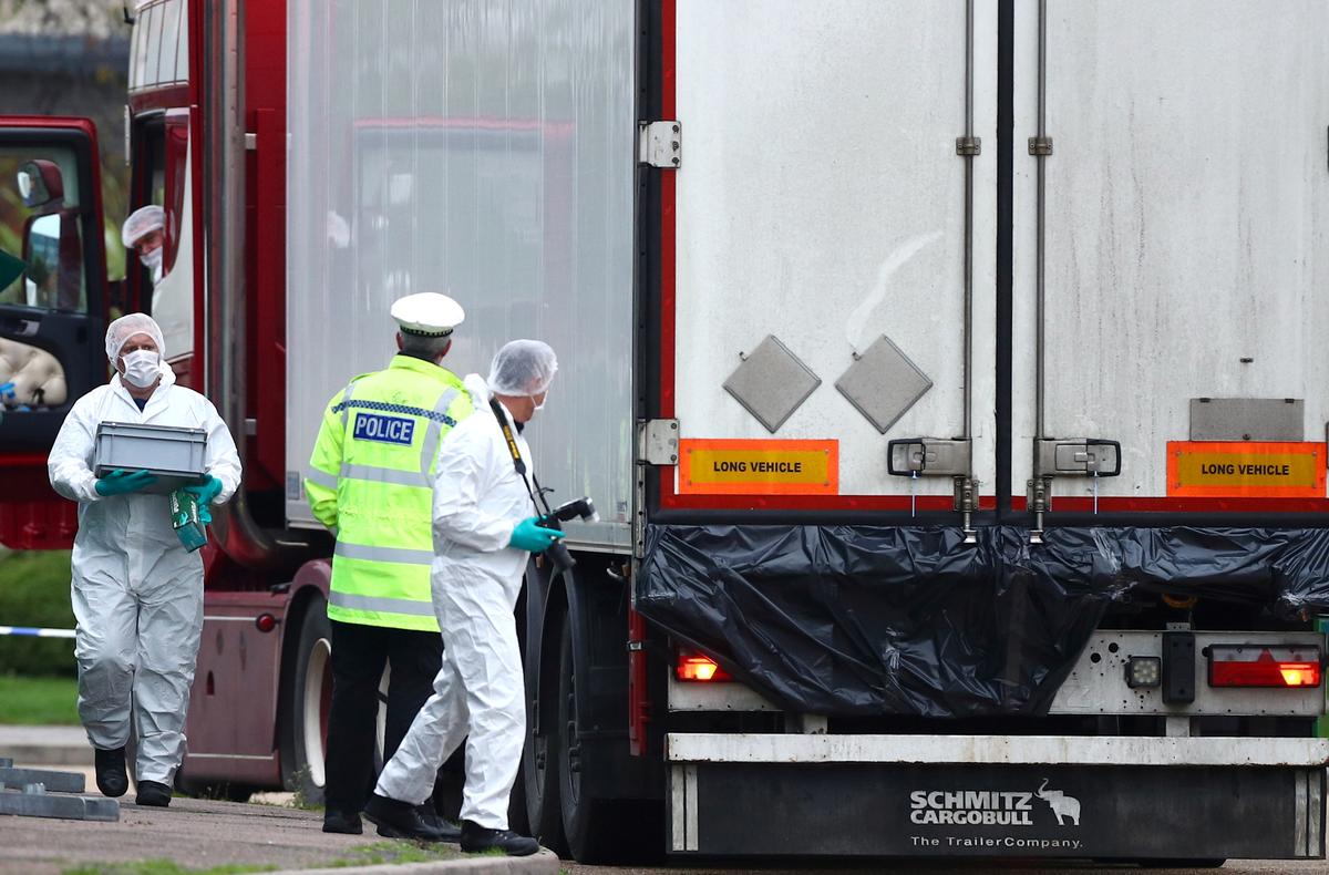 Police are seen at the scene where bodies were discovered in a lorry container, in Grays, Essex, Britain October 23, 2019. Photo: Reuters