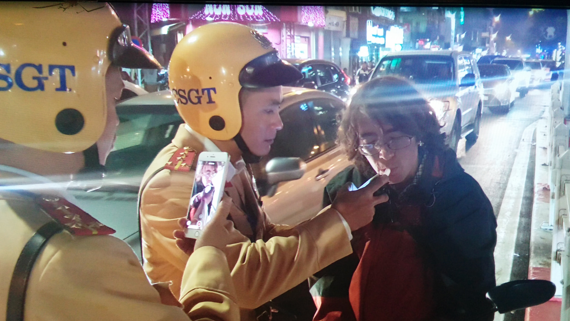Russian Aleks Ivanov takes a breathalyzer test after being stopped by traffic police in Hanoi on January 7, 2020. Photo: Xuan Bui / Tuoi Tre