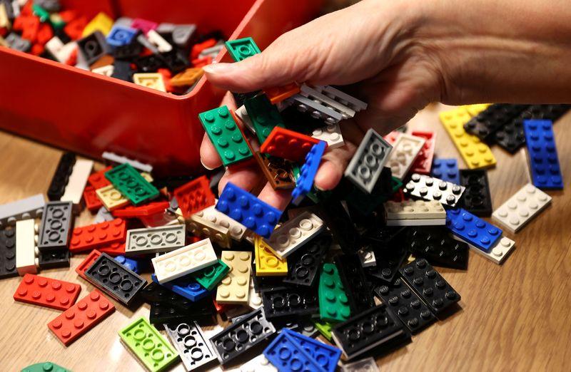 Rita Ebel, nicknamed 'Lego grandma,' builds a wheelchair ramp from donated Lego bricks in the living room of her flat in Hanau, Germany, February 17, 2020. Picture taken February 17, 2020. Ebel started to build the ramps almost one year ago to raise awareness for handicapped people in her hometown of Hanau. Meanwhile, dozens of stores use the ramps to ease entry for wheelchair users.  Photo: Reuters