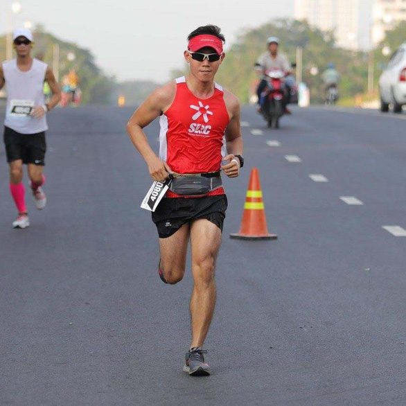 Phan Thanh Tuan, founder of the Sunday Running Club with thousands of members, wears an SRC uniform while joining a run in this supplied photo.
