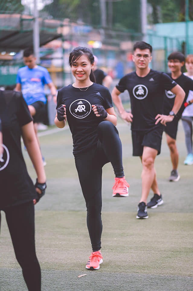 Tran Ho Nguyen Thao warms up before a run in this provided photo.