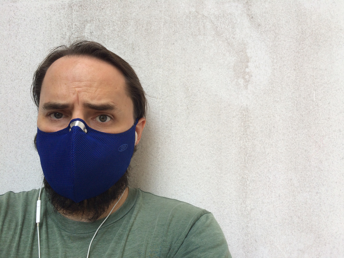 The author is seen wearing a face mask outside a home in Thao Dien Ward, District 2, Ho Chi Minh City in this supplied photo.