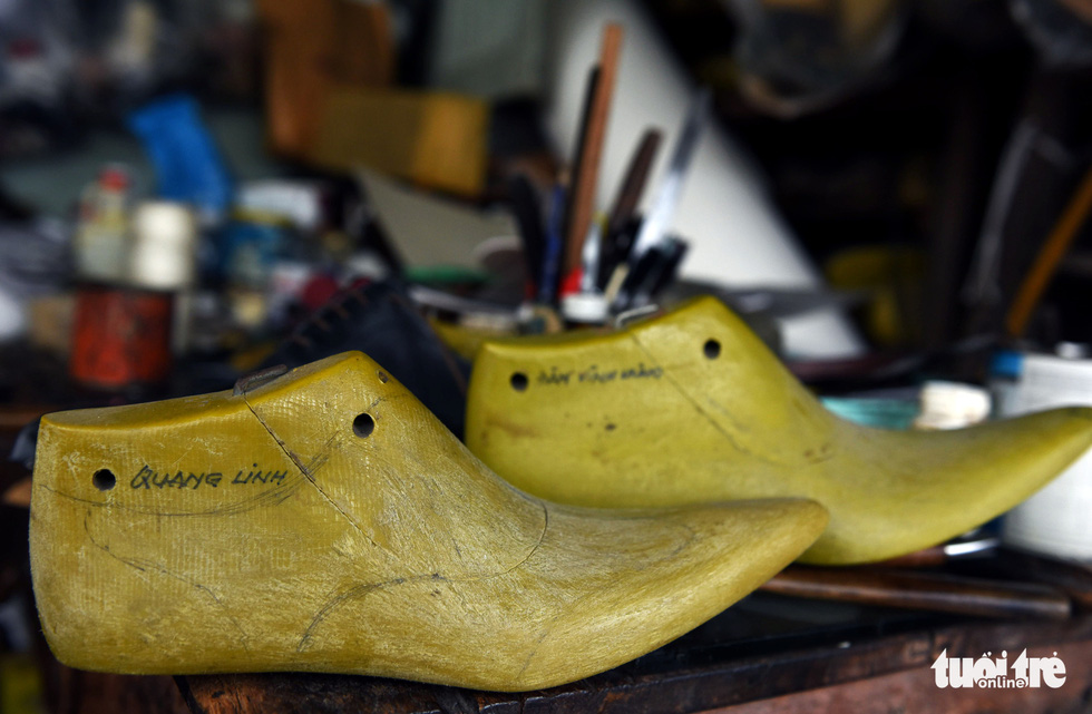 Molds used to made shoes for Vietnamese singers Quang Linh (front) and Dam Vinh Hung (back), two of Ngoc’s celebrity customers. Photo: Duyen Phan / Tuoi Tre