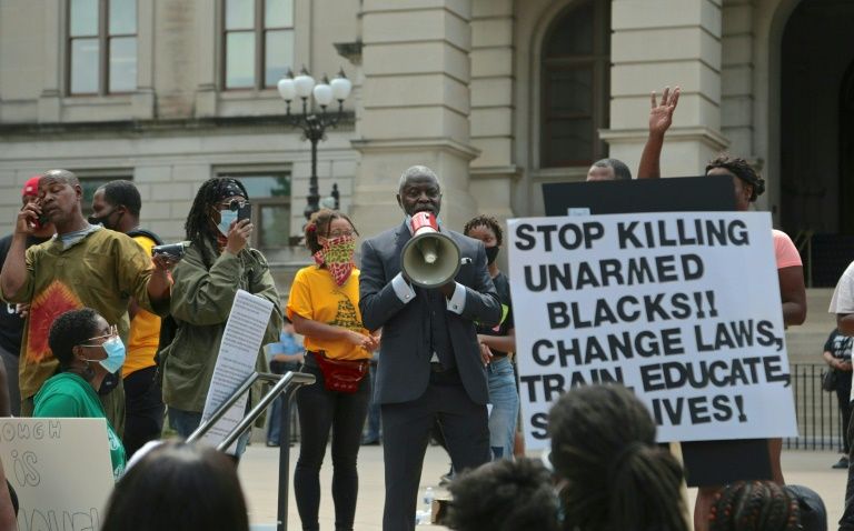 Protestors in Atlanta demonstrate on June 15 against the police shooting of 27-year-old Rayshard Brooks, during a confrontation after Brooks was found asleep in his car at a fast food restaurant. Photo: AFP
