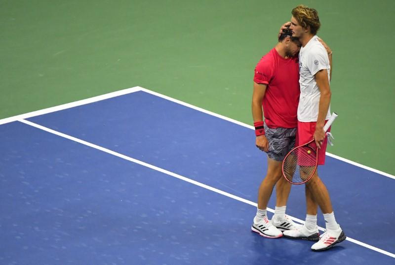 Dominic Thiem of Austria embraces Alexander Zverev of Germany after defeating Zverev in the men's singles final match on day 14 of the 2020 U.S. Open tennis tournament at USTA Billie Jean King National Tennis Center, Flushing Meadows, New York, USA, Sep 13, 2020. Photo: USA TODAY Sports via Reuters