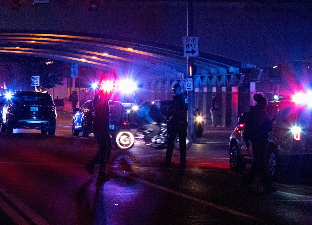Louisville Police secure the area after 2 police officers were shot during a protest where protesters clashed with police after a grand jury considering the March killing of Breonna Taylor, a Black medical worker, in her home in Louisville, Kentucky, voted to indict one of three white police officers for wanton endangerment, in Louisville, Kentucky, U.S. September 23, 2020. Photo: Reuters