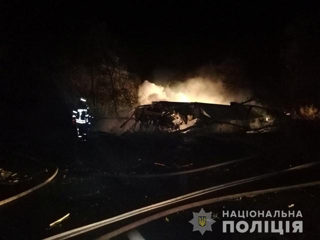 A rescuer inspects wreckages of the Ukrainian military Antonov An-26 plane after crashing outside of Chuhuiv town, Ukraine September 25, 2020. Photo: Press Service of the National Police of Ukraine via Reuters