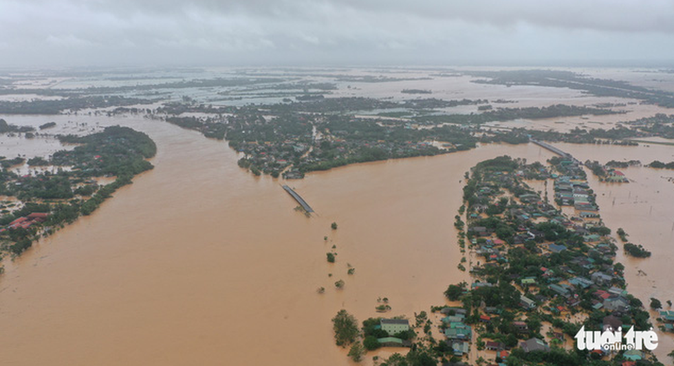 This aerial photo shows a vast flooded region in central Vietnam. Photo: Truong Trung / Tuoi Tre