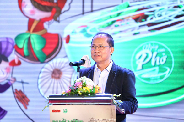 Tuoi Tre (Youth) newspaper’s Deputy Editor-in-Chief Le Xuan Trung speaks at the opening ceremony of the ‘Day of Pho’ 2020 event at AEON Mall Ha Dong in Hanoi, December 12, 2020. Photo: Nam Khanh / Tuoi Tre