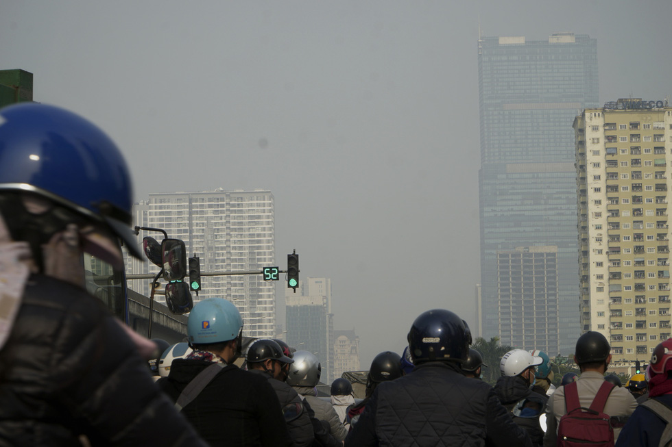 Keangnam Landmark Tower, the tallest building in Hanoi, is seen through the grey haze. Pham Tuan / Tuoi Tre