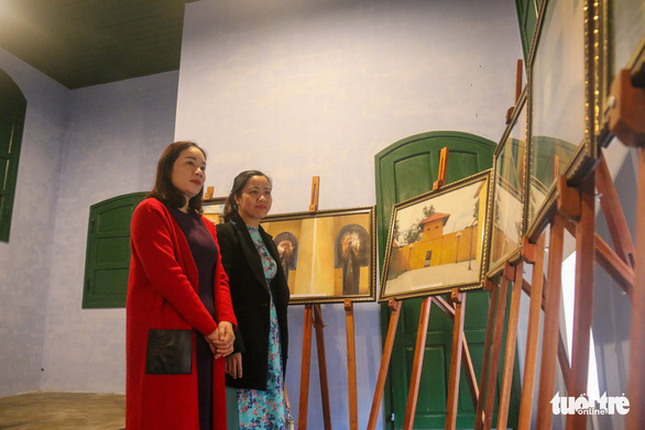 Visitors attend an exhibition at Thua Phu Prison.