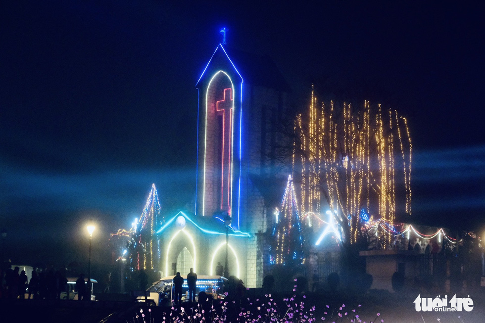 The Stone Church is lighted up with decorative lights in Sa Pa Town, Lao Cai Province, Vietnam, December 31, 2020. Photo: Nam Tran / Tuoi Tre