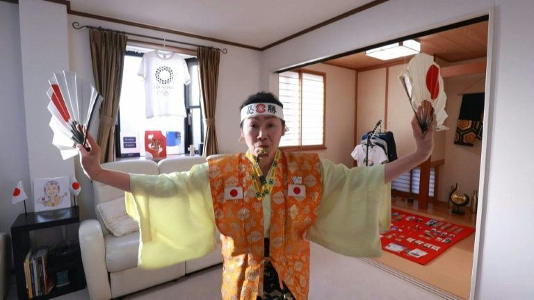 Olympic super-fan determined to welcome world to Tokyo. Photo: AFP