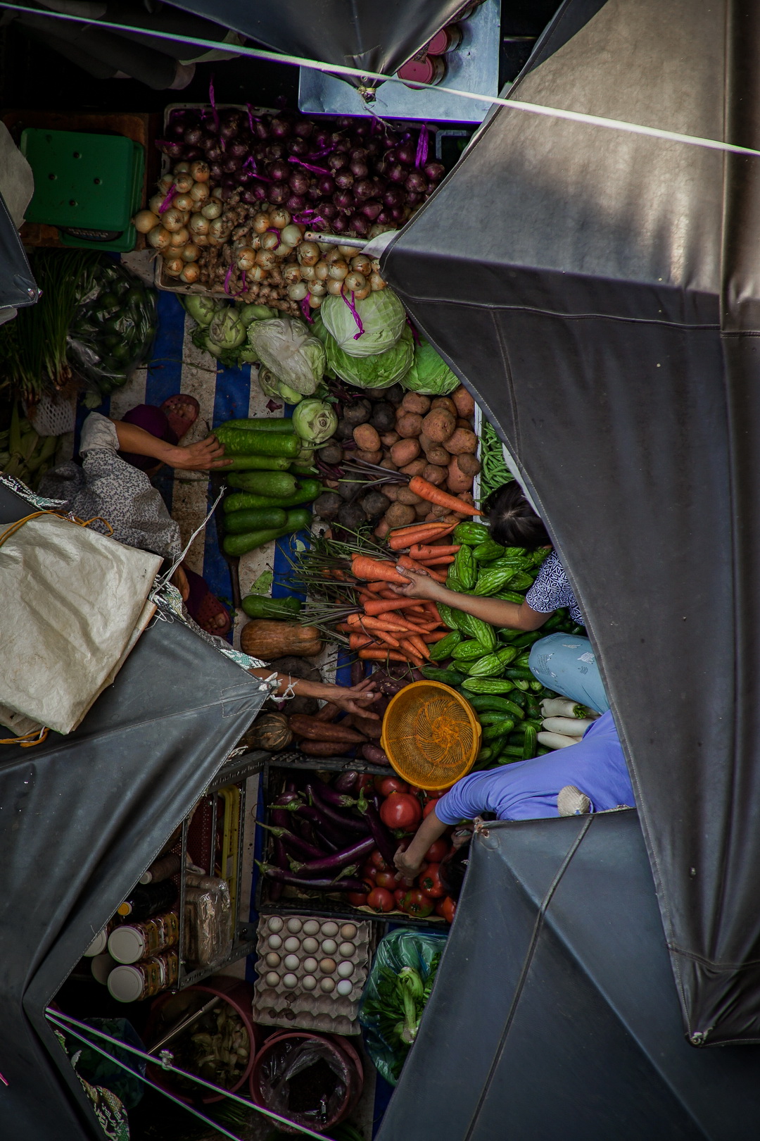 A photo from above by Van Nguyen shows vegetables being sold a local wet market in Saigon