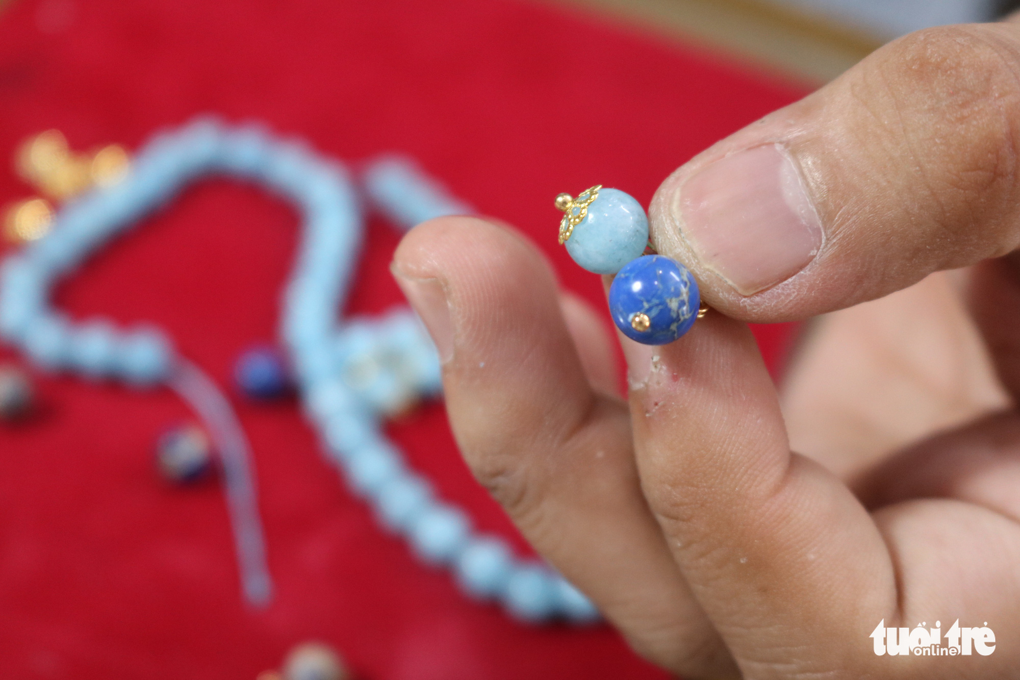 Tran Quang Minh Tan makes buttons for Nguyen Dynasty clothing