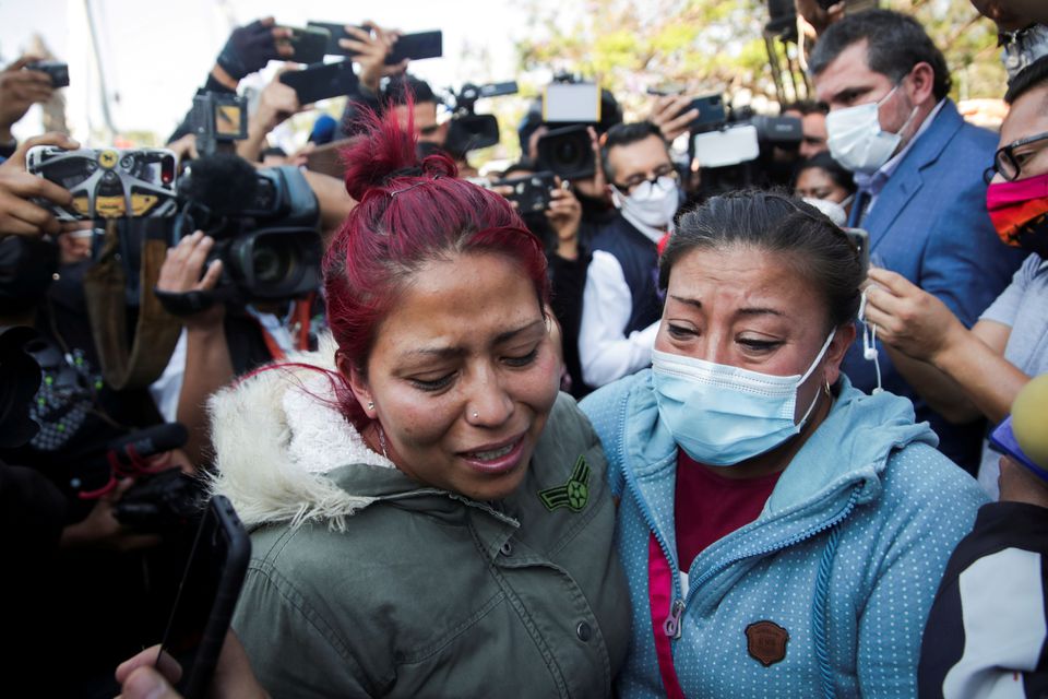 Relatives arrive looking for Brandon Giovani Hernandez Tapia, near the site where an overpass for a metro partially collapsed with train cars on it at Olivos station in Mexico City, Mexico May 4, 2021. Photo: Reuters