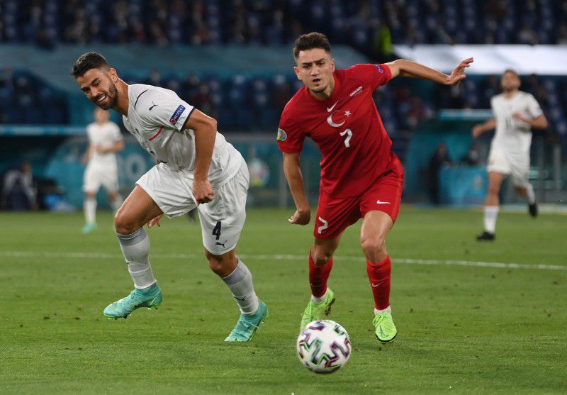 Soccer Football - Euro 2020 - Group A - Turkey v Italy - Stadio Olimpico, Rome, Italy - June 11, 2021 Turkey's Cengiz Under in action with Italy's Leonardo Spinazzola. Pool via Reuters