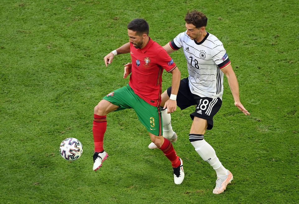 Soccer Football - Euro 2020 - Group F - Portugal v Germany - Football Arena Munich, Munich, Germany - June 19, 2021 Portugal's Joao Moutinho in action with Germany's Leon Goretzka. Photo: Pool via Reuters