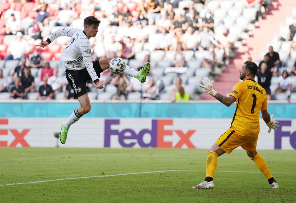 Soccer Football - Euro 2020 - Group F - Portugal v Germany - Football Arena Munich, Munich, Germany - June 19, 2021 Germany's Kai Havertz in action with Portugal's Rui Patricio. Photo: Pool via Reuters
