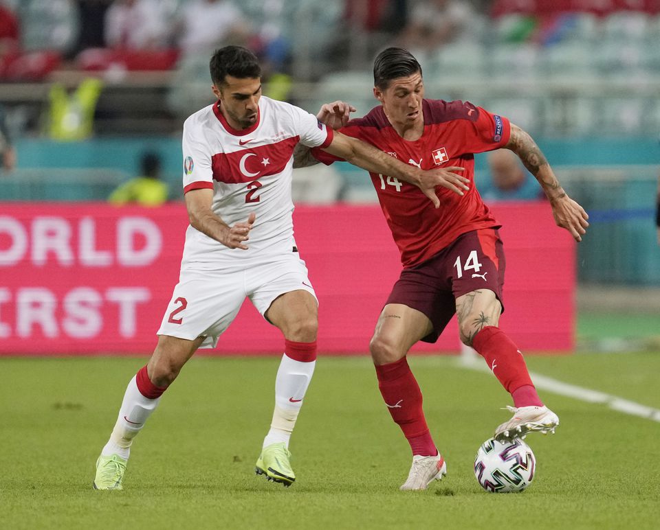 Soccer Football - Euro 2020 - Group A - Switzerland v Turkey - Baku Olympic Stadium, Baku, Azerbaijan - June 20, 2021 Switzerland's Steven Zuber in action with Turkey's Zeki Celik. Photo: Pool via Reuters